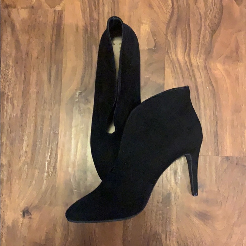 Black heel booties with front slit
